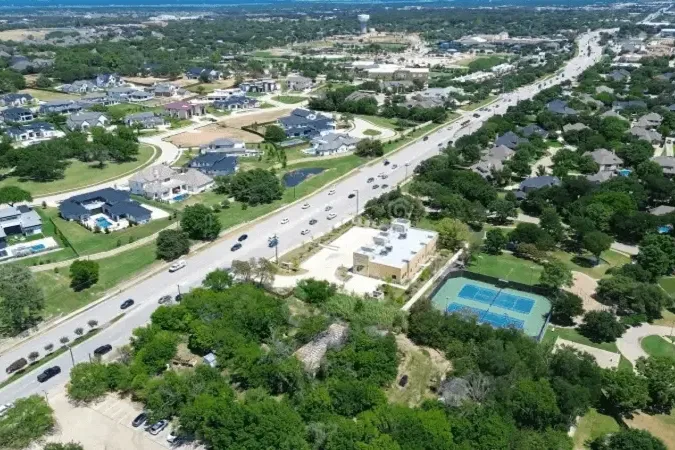Aerial view of a main road and neighborhoods in Keller, Texas