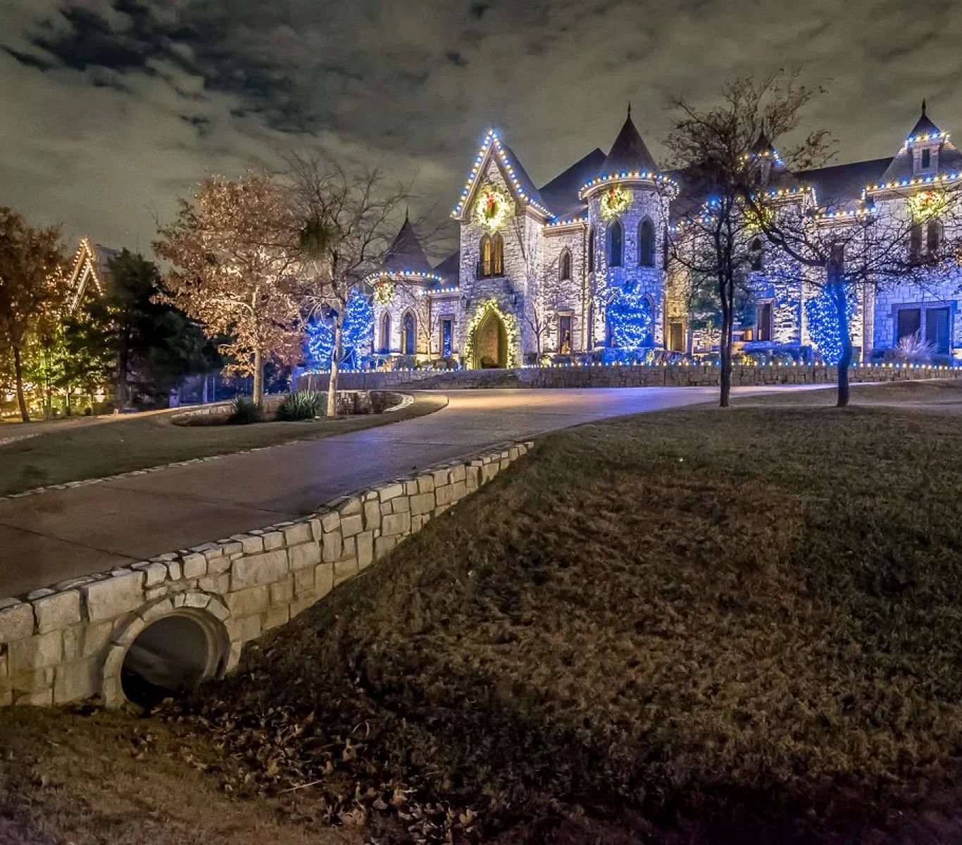Team carefully removing lights from a residential roof after the season